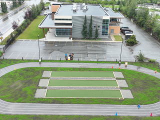 Overhead view of three bocce ball courts.