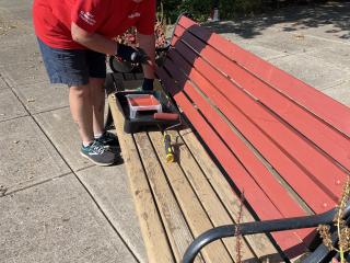 Painting benches.