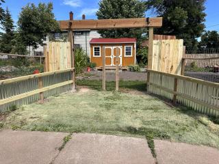 New entrance and fence to community garden.