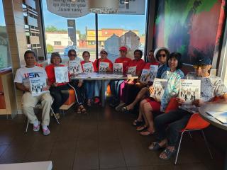 Group meets at local fast food restaurant to begin walk-audit with toolkits in hand.