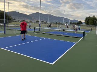 Players using pickleball courts.