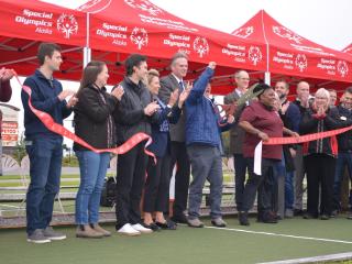 Ribbon cutting for bocce ball courts.