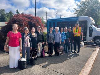 Group photo of older adults taking free transit ride.