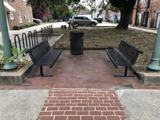 New bike racks, benches, and trash can.