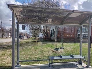 New bus shelter and bench seating.