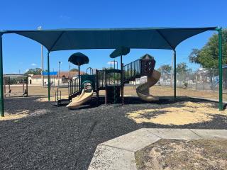 Shade structure over playground.