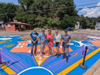 New street mural in front of library.