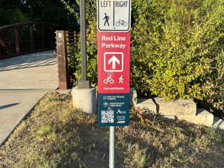 Installed directional sign for Red Line Parkway.