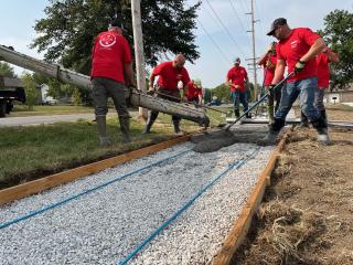 Pouring concrete for new sidewalk.