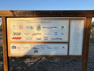 Welcoming sign to garden.