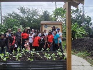 Group photo after planting raised garden beds.