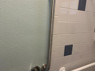 New grab bar installed in shower/tub.