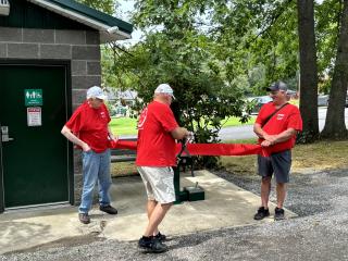 Ribbon cutting for new drinking fountain.