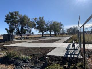 Accessible garden paths installed awaiting raised garden beds.