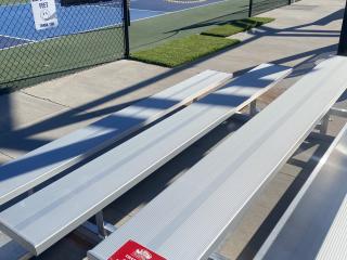 Bleachers with AARP sign.