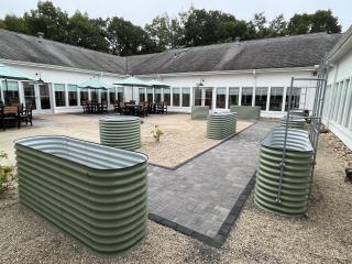 Senior Center courtyard after raised garden beds installed.