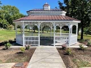 Completed gazebo with landscaping.
