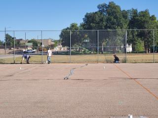 Pickleball court before paint.