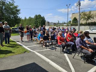 Audience at ribbon cutting.