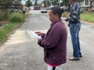 Two older adults conducting a Walk Audit.