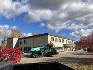 New building having parking lot paved.