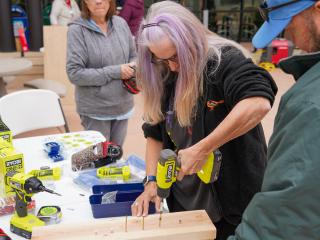 Older adults learning to use a power drill