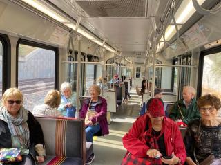 Older adults ride public transit.