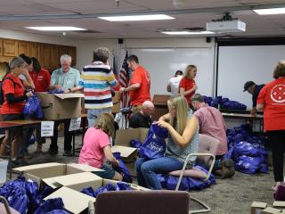 Volunteer packing "go bags".