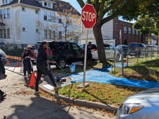 Painting sidewalks for pedestrian visibility.