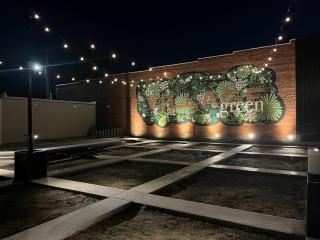 Light illuminate Village Green mural