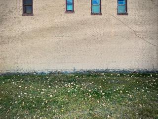 Side of bank building before mural.