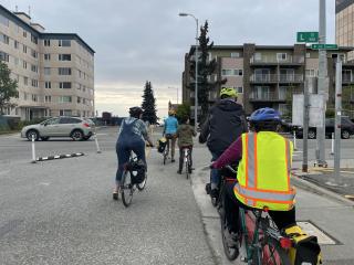 Group riding on new Protected Bike Lane (PBL).