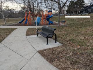 New bench adjacent to playground.