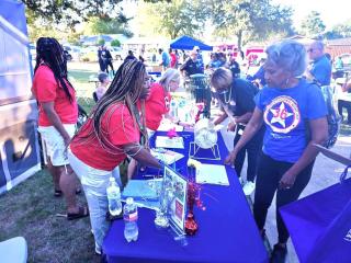 Table at National Night Out discussing Accessory Dwelling Units