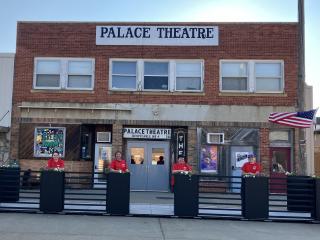 New parklet with seating outside Palace Theatre.