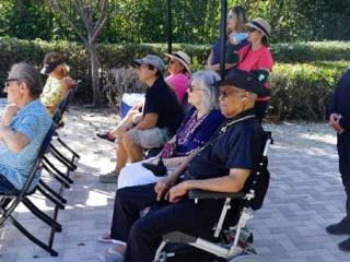 Attendees at ribbon cutting event.