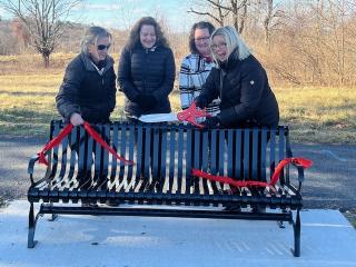 Ribbon cutting for bench.