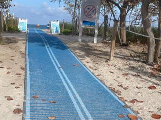 Accessible mats to access the beach.