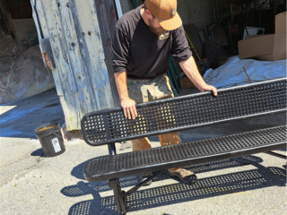 Unpacking new benches.