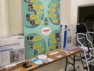 Poster and display of HomeFit safety modifications.