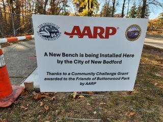 Sign acknowledging AARP funding.