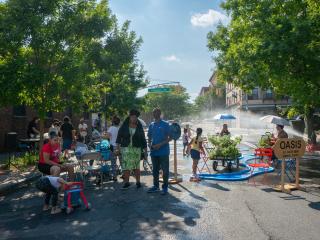 "Oasis" pop-up cooling station on street.