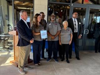 Presentation of plaque for Hall of Flags.