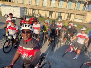 Group conducting an on-bike Bike Audit.