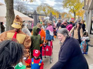 Halloween trick-or-treaters walking in Berkley.