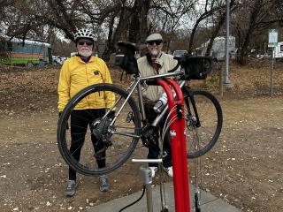 New bike fixit station and tire pump in use.