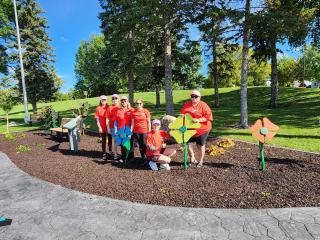 Volunteers in musical garden.