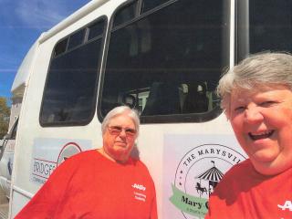 Staff members ready to drive shuttle bus.