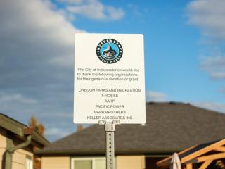 Sign acknowledging AARP funding.