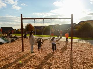 Children playing at new playround.